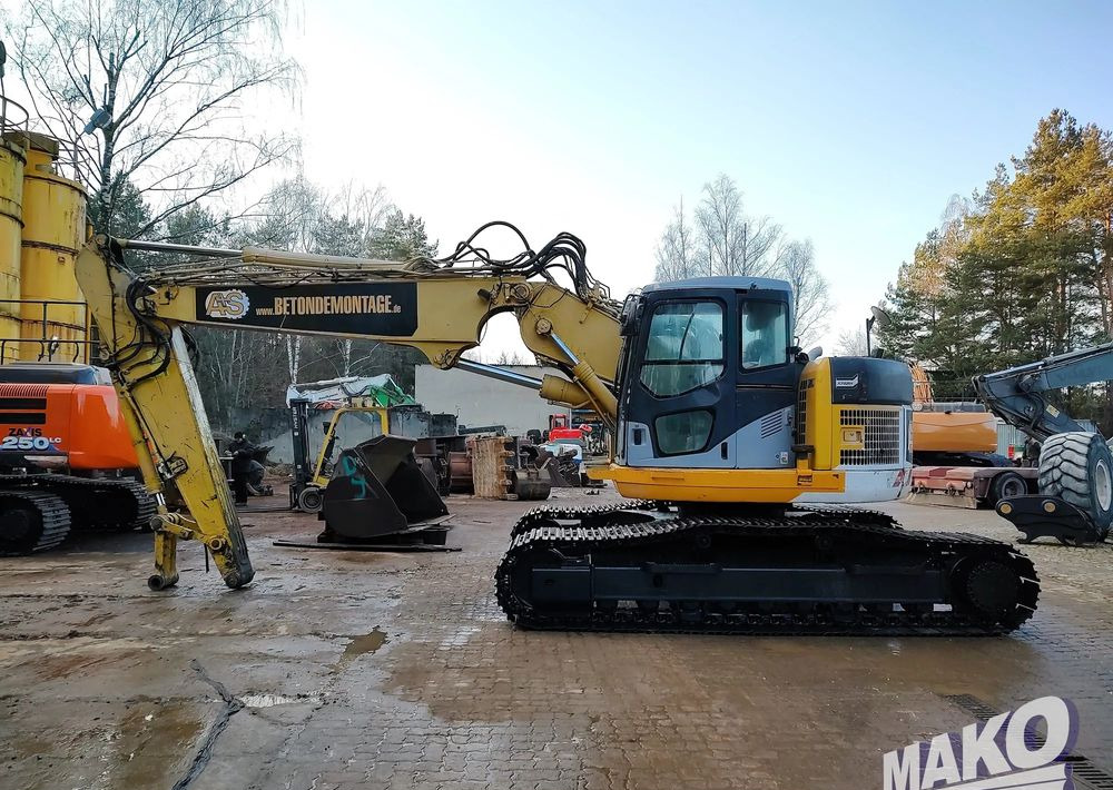 Komatsu PC228USLC-3 - حفارات زحافة: صور 1 Komatsu PC228USLC-3 - حفارات زحافة: صور 1