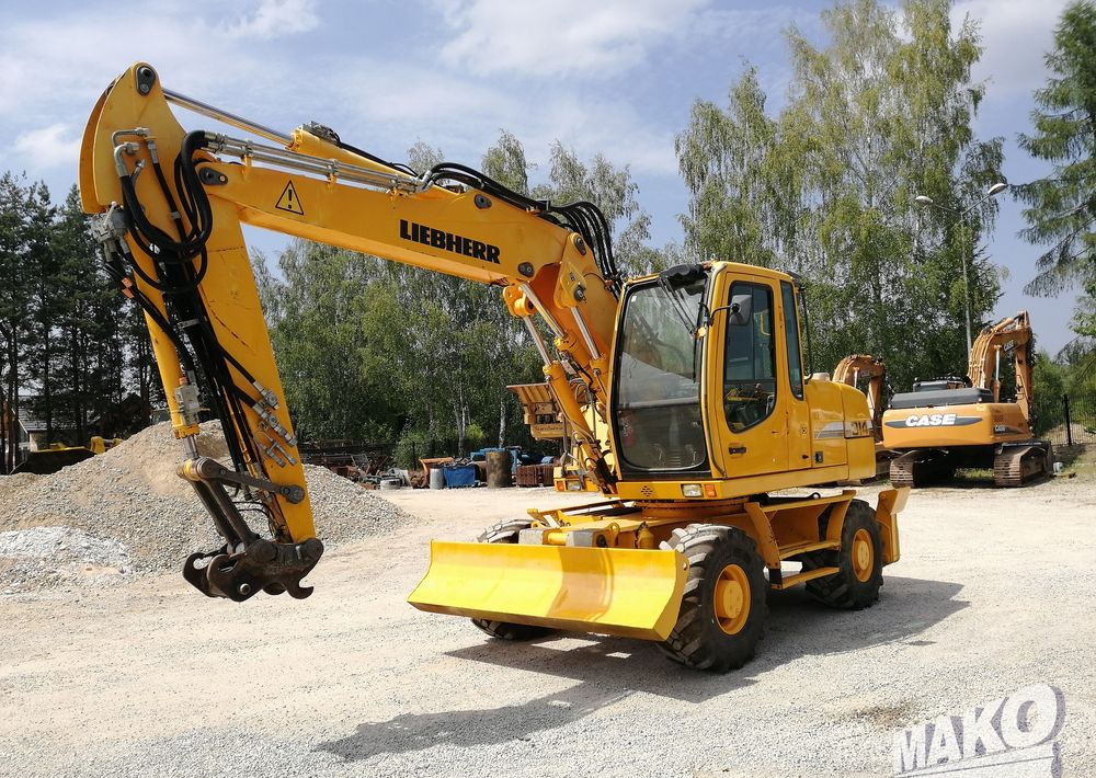 Liebherr A 314 Litronic - حفارة على عجلات: صور 1 Liebherr A 314 Litronic - حفارة على عجلات: صور 1