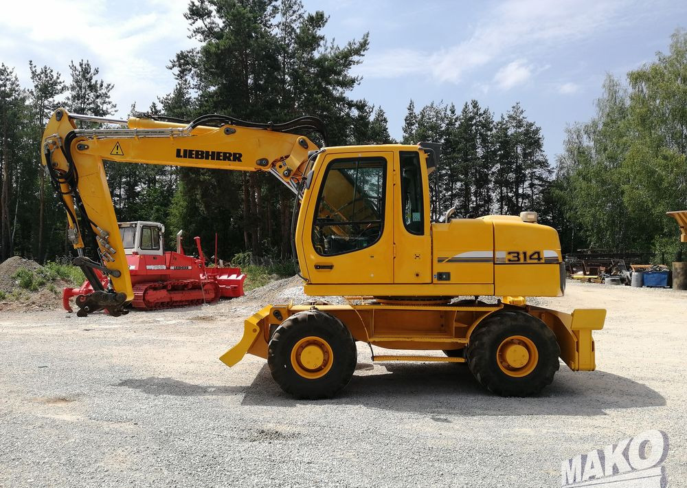 Liebherr A 314 Litronic - حفارة على عجلات: صور 2 Liebherr A 314 Litronic - حفارة على عجلات: صور 2