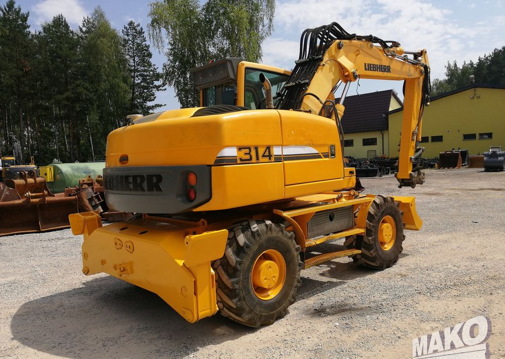 Liebherr A 314 Litronic - حفارة على عجلات: صور 5 Liebherr A 314 Litronic - حفارة على عجلات: صور 5