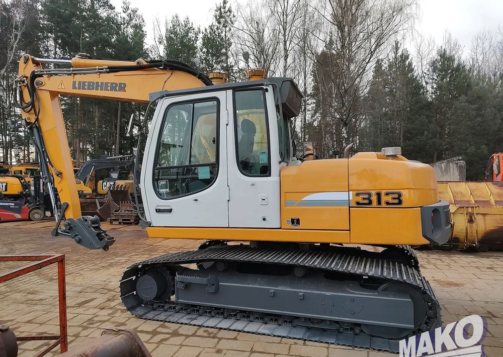 Liebherr R 313 Litronic - حفارات زحافة: صور 1 Liebherr R 313 Litronic - حفارات زحافة: صور 1