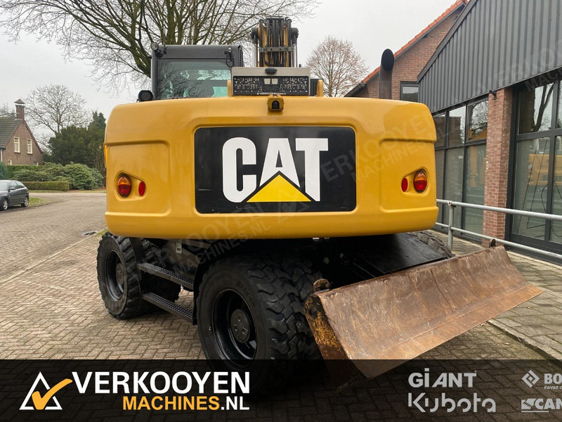 Caterpillar M313D - حفارة على عجلات: صور 4 Caterpillar M313D - حفارة على عجلات: صور 4