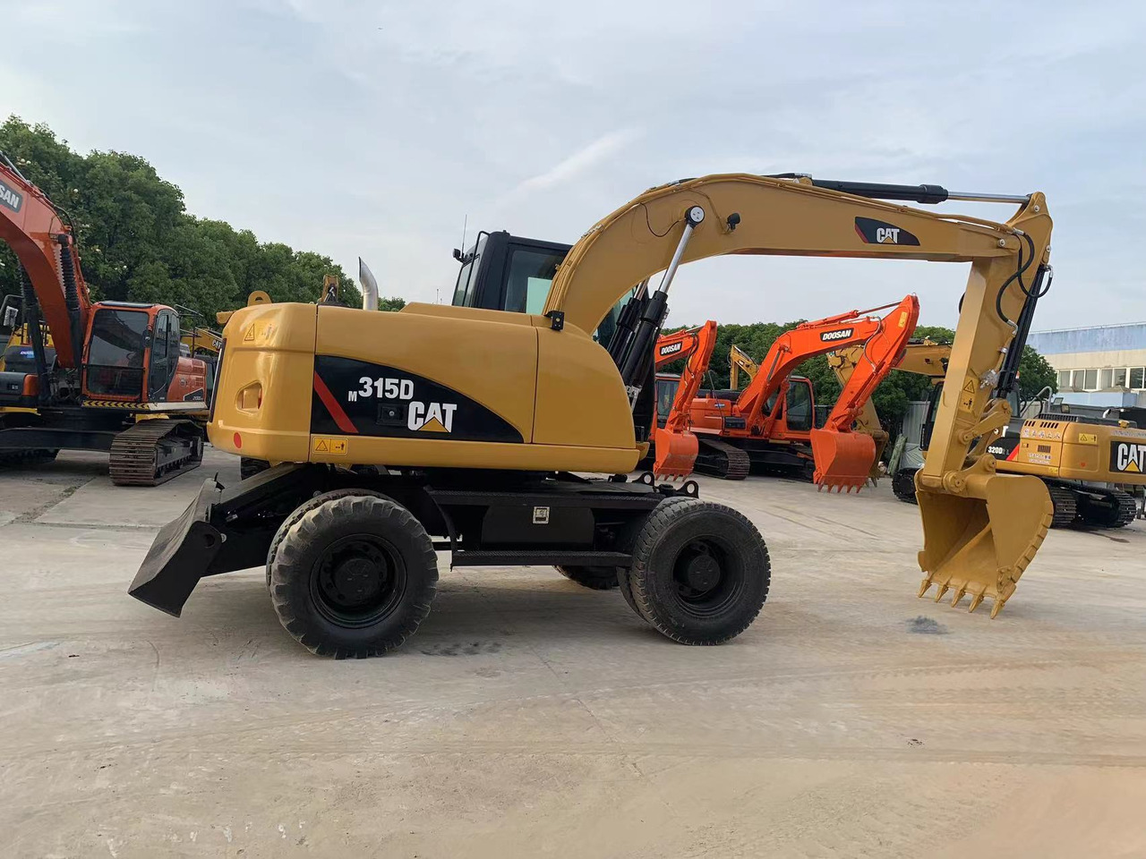 Caterpillar M315D Wheel Excavator Moving by Tires - حفارة على عجلات: صور 3 Caterpillar M315D Wheel Excavator Moving by Tires - حفارة على عجلات: صور 3