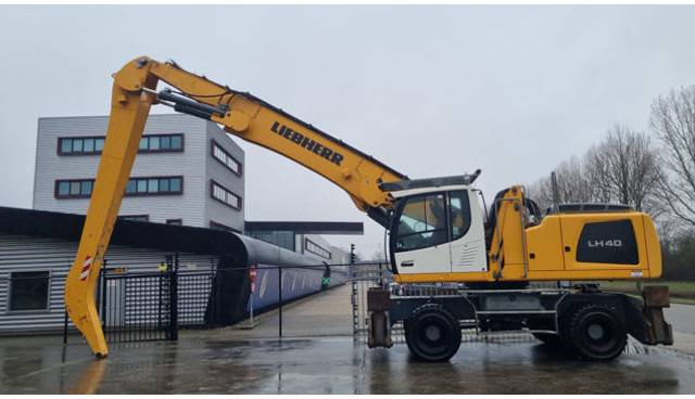Liebherr LH 40 M Industry Litronic - حفارة النقل والشحن: صور 1 Liebherr LH 40 M Industry Litronic - حفارة النقل والشحن: صور 1