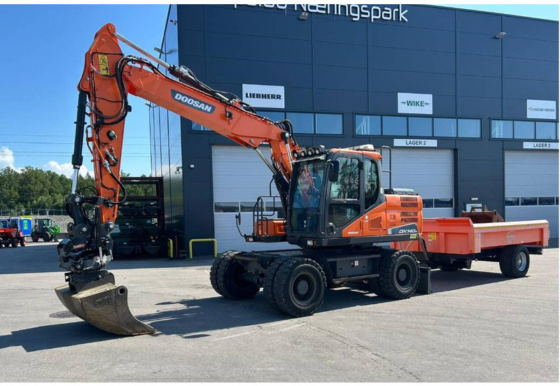 Doosan DX 140 W-5 - حفارة على عجلات: صور 1 Doosan DX 140 W-5 - حفارة على عجلات: صور 1