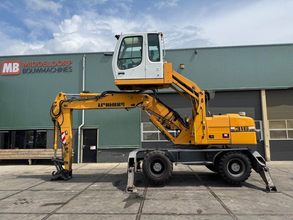 Liebherr A 316 - حفارة النقل والشحن: صور 1 Liebherr A 316 - حفارة النقل والشحن: صور 1