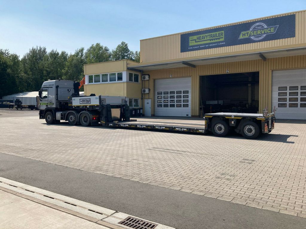 Meusburger 2-Achs-Tiefbett-Sattelauflieger mit Pendelachsen - عربة مسطحة منخفضة نصف مقطورة: صور 1 Meusburger 2-Achs-Tiefbett-Sattelauflieger mit Pendelachsen - عربة مسطحة منخفضة نصف مقطورة: صور 1