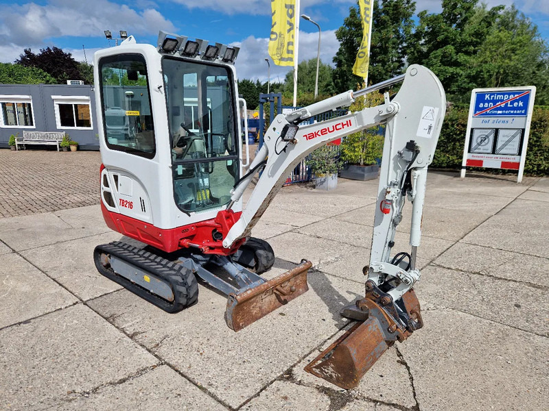 Takeuchi TB216 met 2089 uur - حفارة مصغرة: صور 2 Takeuchi TB216 met 2089 uur - حفارة مصغرة: صور 2