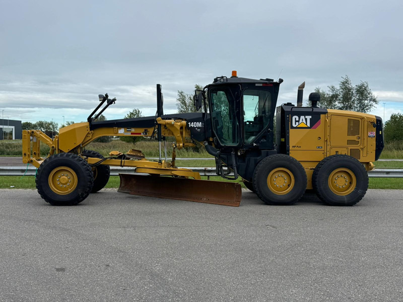 Caterpillar 140M2 - آلة تسوية الأرض: صور 1 Caterpillar 140M2 - آلة تسوية الأرض: صور 1