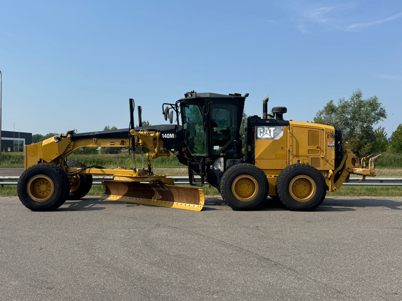 Caterpillar 140M3 - آلة تسوية الأرض: صور 1 Caterpillar 140M3 - آلة تسوية الأرض: صور 1