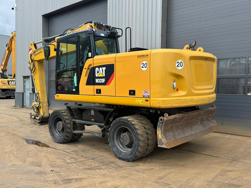 Caterpillar M320F - حفارة على عجلات: صور 3 Caterpillar M320F - حفارة على عجلات: صور 3