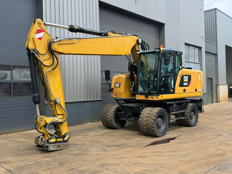 Caterpillar M320F - حفارة على عجلات: صور 2 Caterpillar M320F - حفارة على عجلات: صور 2