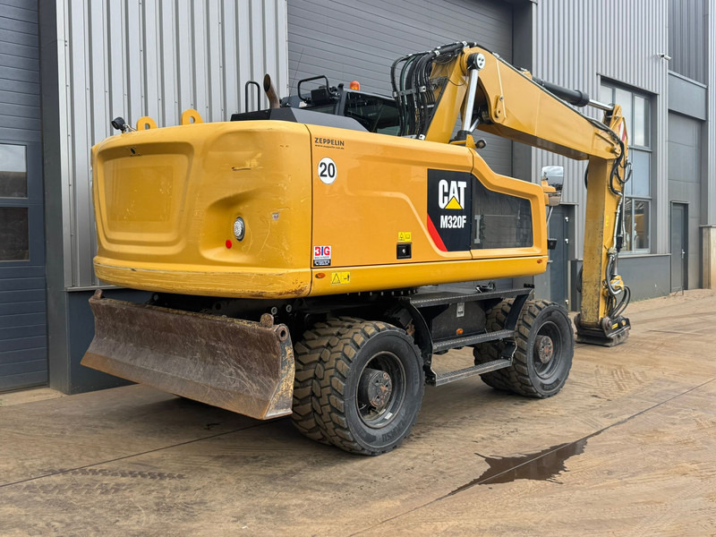 Caterpillar M320F - حفارة على عجلات: صور 5 Caterpillar M320F - حفارة على عجلات: صور 5