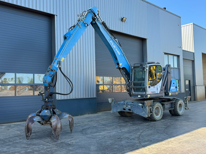Fuchs MHL 250 E - حفارة النقل والشحن: صور 2 Fuchs MHL 250 E - حفارة النقل والشحن: صور 2
