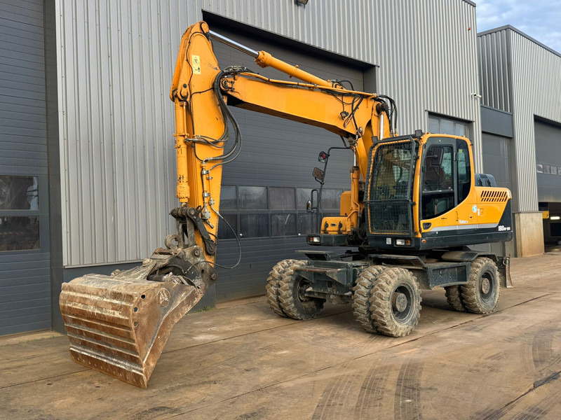 Hyundai Robex 180W-9A - حفارة على عجلات: صور 2 Hyundai Robex 180W-9A - حفارة على عجلات: صور 2