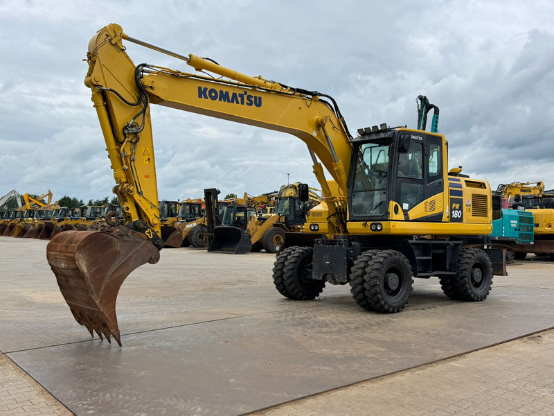 Komatsu PW180-11 - حفارة على عجلات: صور 2 Komatsu PW180-11 - حفارة على عجلات: صور 2