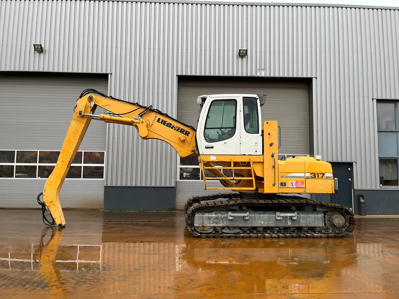 Liebherr R317 Litronic Material Handler - حفارة النقل والشحن: صور 1 Liebherr R317 Litronic Material Handler - حفارة النقل والشحن: صور 1