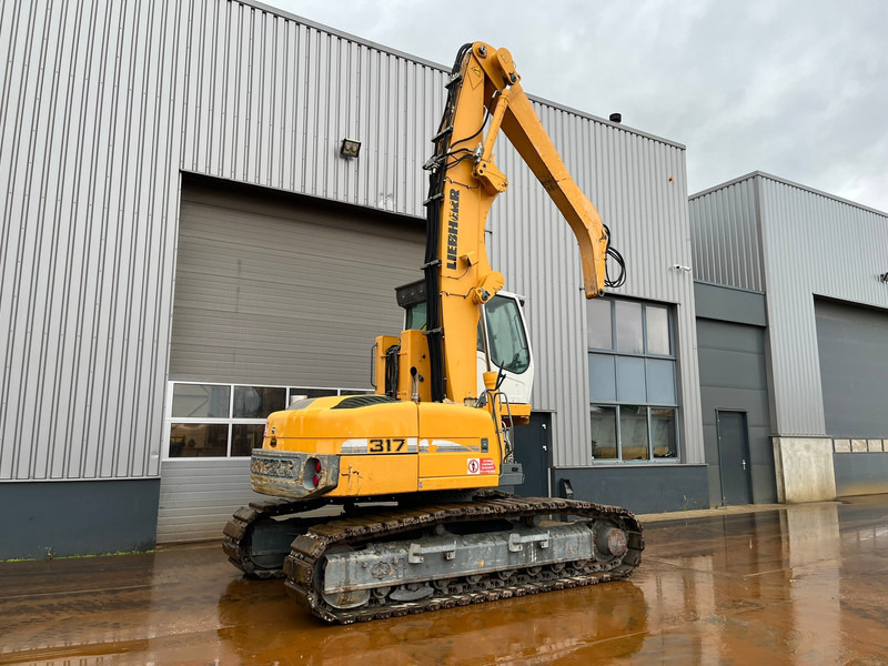 Liebherr R317 Litronic Material Handler - حفارة النقل والشحن: صور 5 Liebherr R317 Litronic Material Handler - حفارة النقل والشحن: صور 5