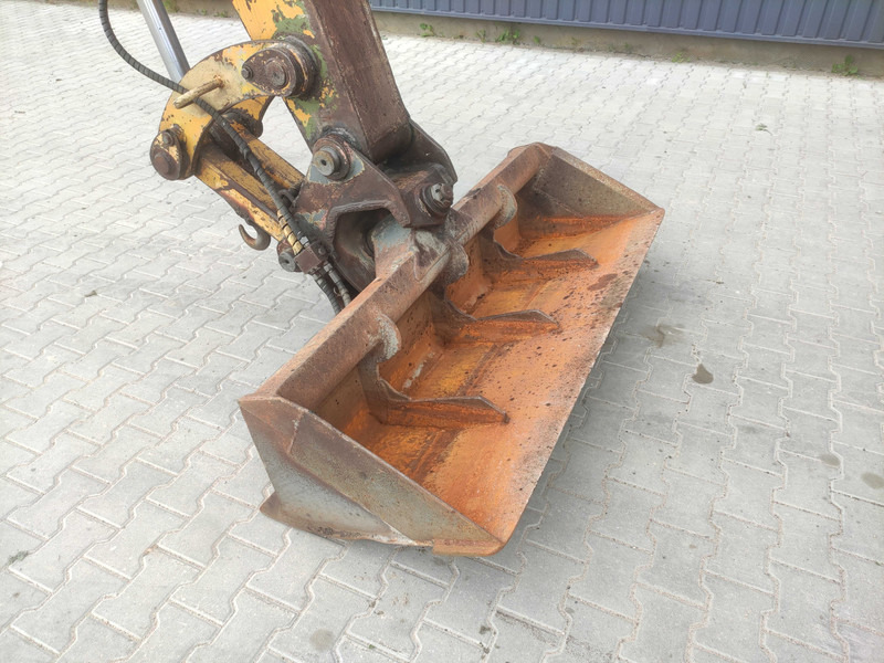 Caterpillar 214 B wheel excavator - حفارة على عجلات: صور 5 Caterpillar 214 B wheel excavator - حفارة على عجلات: صور 5