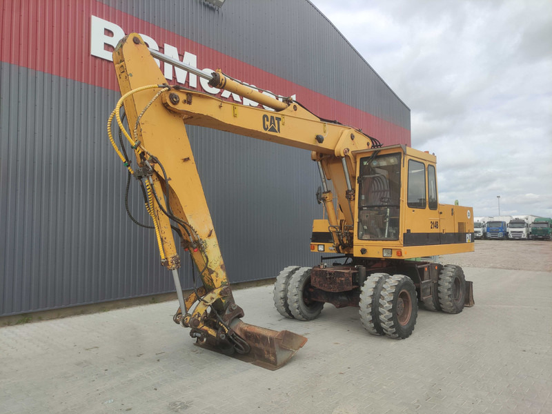 Caterpillar 214 B wheel excavator - حفارة على عجلات: صور 2 Caterpillar 214 B wheel excavator - حفارة على عجلات: صور 2