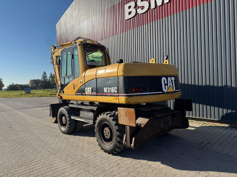Caterpillar M 316 C - حفارة على عجلات: صور 4 Caterpillar M 316 C - حفارة على عجلات: صور 4