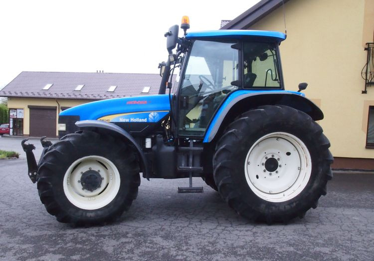 Ciągnik New Holland TM 140 2004 Przedni TUZ - جرار: صور 5 Ciągnik New Holland TM 140 2004 Przedni TUZ - جرار: صور 5