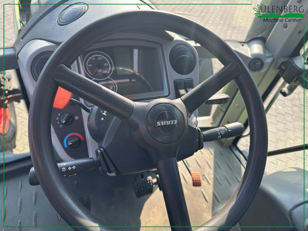 جرار Claas Arion 610 C: صور 11