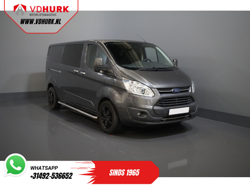 Ford Transit Custom 2.0 TDCI 170 pk E6 Aut. L2 Limited DC Dubbel Cabine BPM VRIJ 2x Schuifdeur/ Stoelverw./ Navi/ Cruise/ Camera/ PDC/ Trekhaak - فان المدمجة, الشاحنات الصغيرة كابينة مزدوجة: صور 1 Ford Transit Custom 2.0 TDCI 170 pk E6 Aut. L2 Limited DC Dubbel Cabine BPM VRIJ 2x Schuifdeur/ Stoelverw./ Navi/ Cruise/ Camera/ PDC/ Trekhaak - فان المدمجة, الشاحنات الصغيرة كابينة مزدوجة: صور 1
