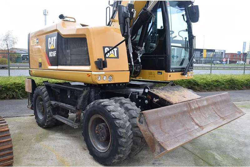 Caterpillar Caterpillar M316F - حفارة على عجلات: صور 3 Caterpillar Caterpillar M316F - حفارة على عجلات: صور 3