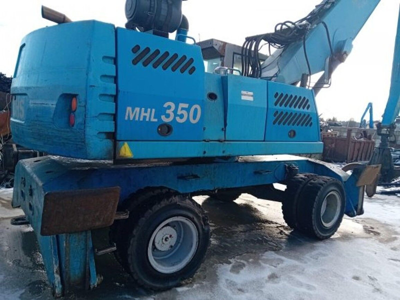 Fuchs MHL350 - حفارة على عجلات: صور 4 Fuchs MHL350 - حفارة على عجلات: صور 4