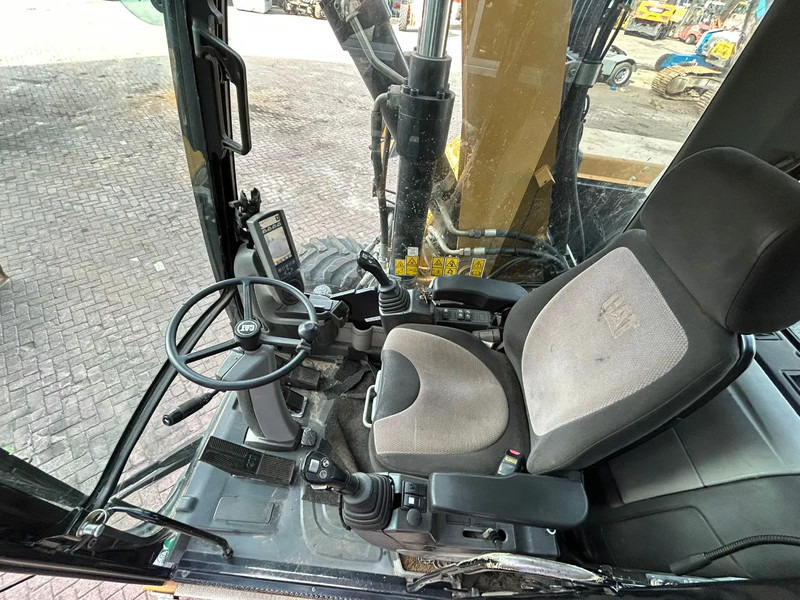 حفارة على عجلات Caterpillar M313D: صور 7 حفارة على عجلات Caterpillar M313D: صور 7