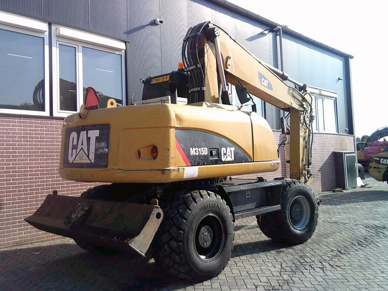 Caterpillar M315D - حفارة على عجلات: صور 3 Caterpillar M315D - حفارة على عجلات: صور 3