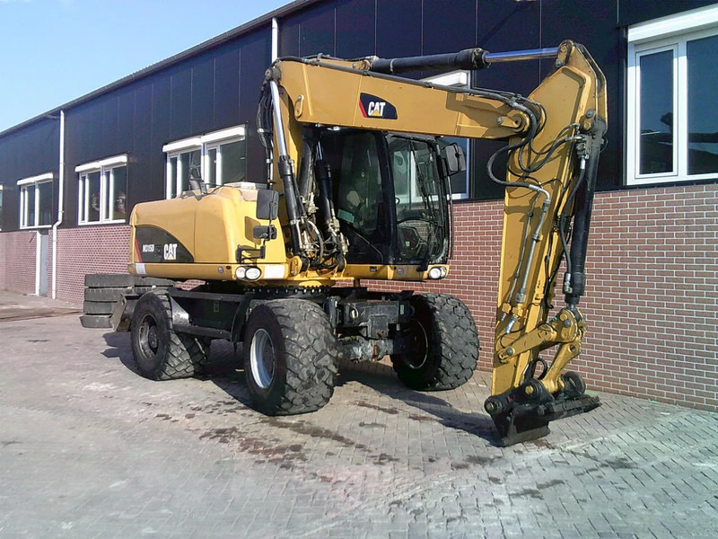 Caterpillar M315D - حفارة على عجلات: صور 4 Caterpillar M315D - حفارة على عجلات: صور 4