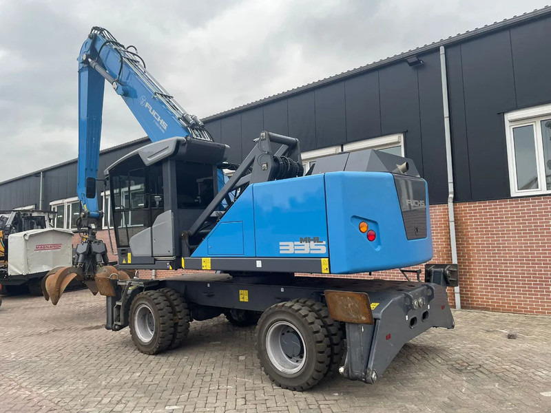 Fuchs MHL335 - حفارة على عجلات: صور 2 Fuchs MHL335 - حفارة على عجلات: صور 2