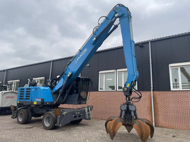 Fuchs MHL335 - حفارة النقل والشحن: صور 4 Fuchs MHL335 - حفارة النقل والشحن: صور 4