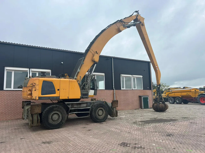 Liebherr LH50M - حفارة النقل والشحن: صور 4 Liebherr LH50M - حفارة النقل والشحن: صور 4