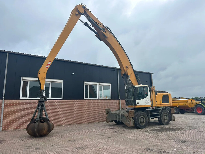 Liebherr LH50M - حفارة النقل والشحن: صور 1 Liebherr LH50M - حفارة النقل والشحن: صور 1