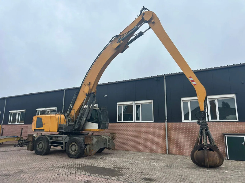 Liebherr LH50M - حفارة النقل والشحن: صور 2 Liebherr LH50M - حفارة النقل والشحن: صور 2