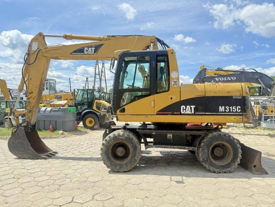 CAT M315C AC - حفارة على عجلات: صور 1 CAT M315C AC - حفارة على عجلات: صور 1