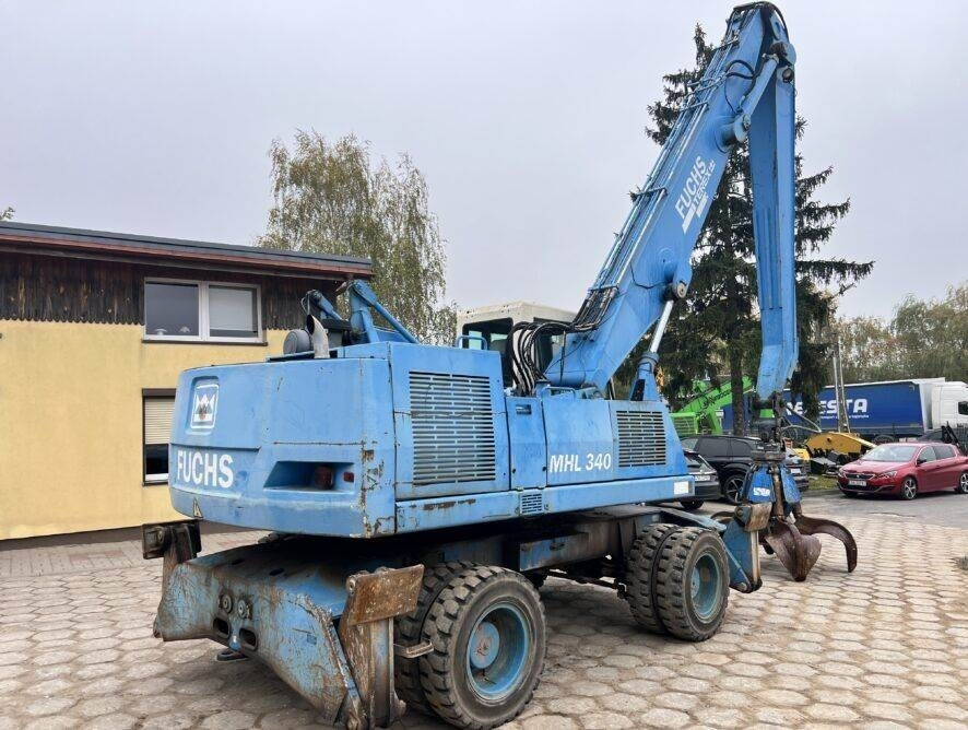 Fuchs MHL340 grab + generator - حفارة النقل والشحن: صور 5 Fuchs MHL340 grab + generator - حفارة النقل والشحن: صور 5