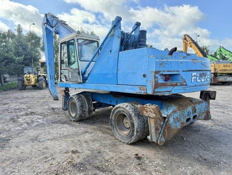 Fuchs MHL350 D - حفارة النقل والشحن: صور 5 Fuchs MHL350 D - حفارة النقل والشحن: صور 5