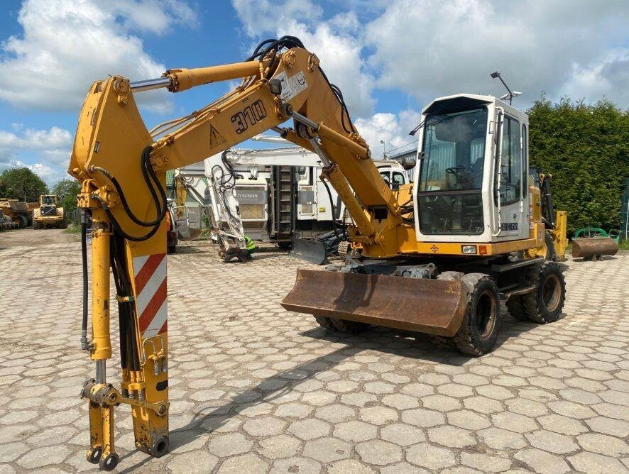 Liebherr A310B - حفارة على عجلات: صور 4 Liebherr A310B - حفارة على عجلات: صور 4