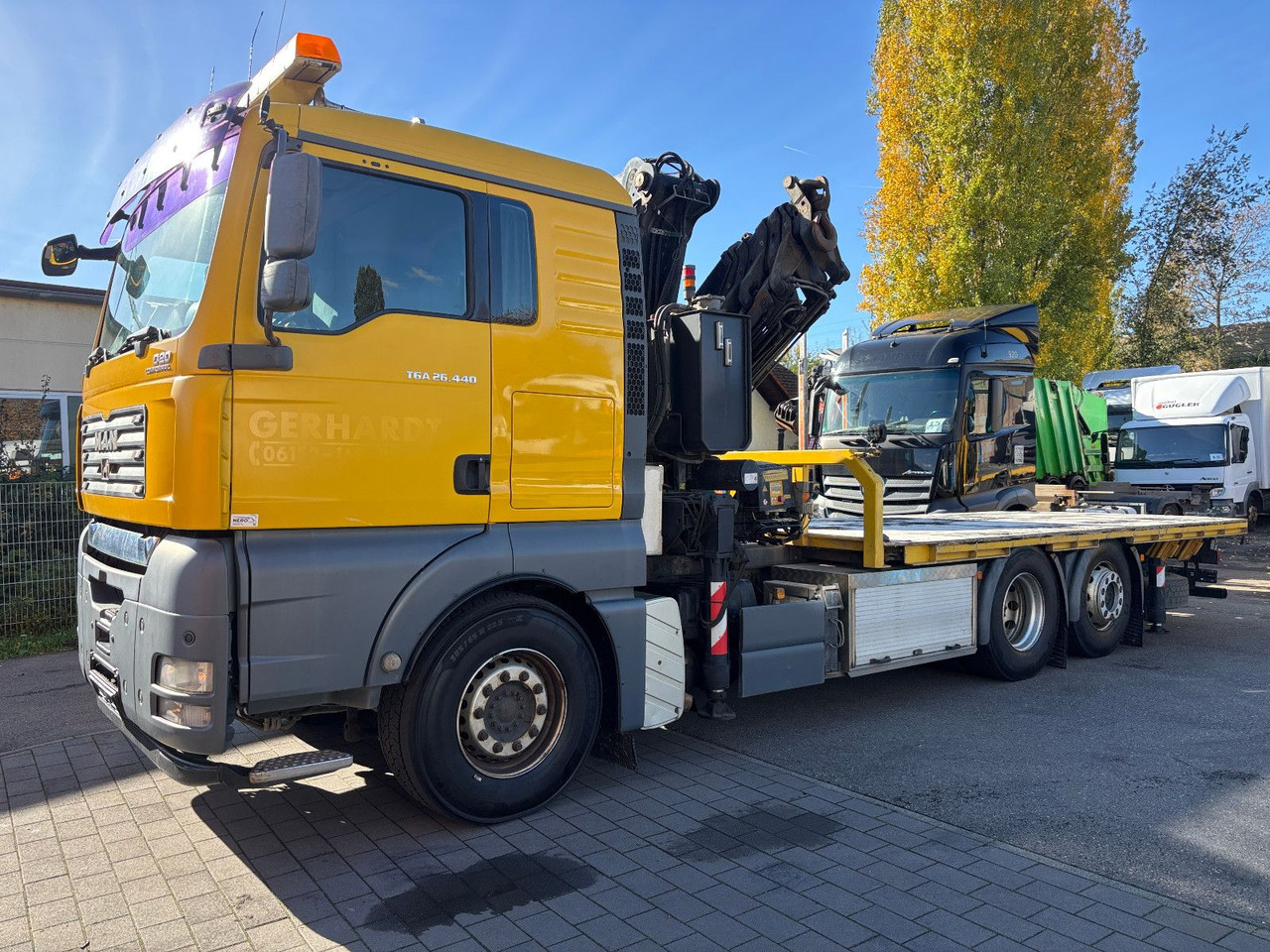 MAN TGA 26.440 FASSI F450AXP Containerauf./Lenkachse - شاحنة كرين: صور 1 MAN TGA 26.440 FASSI F450AXP Containerauf./Lenkachse - شاحنة كرين: صور 1