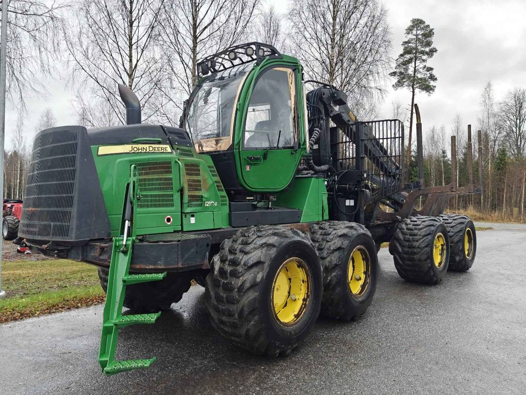 John Deere 1210 E - شاحنات نقل الأخشاب في الغابات: صور 1 John Deere 1210 E - شاحنات نقل الأخشاب في الغابات: صور 1
