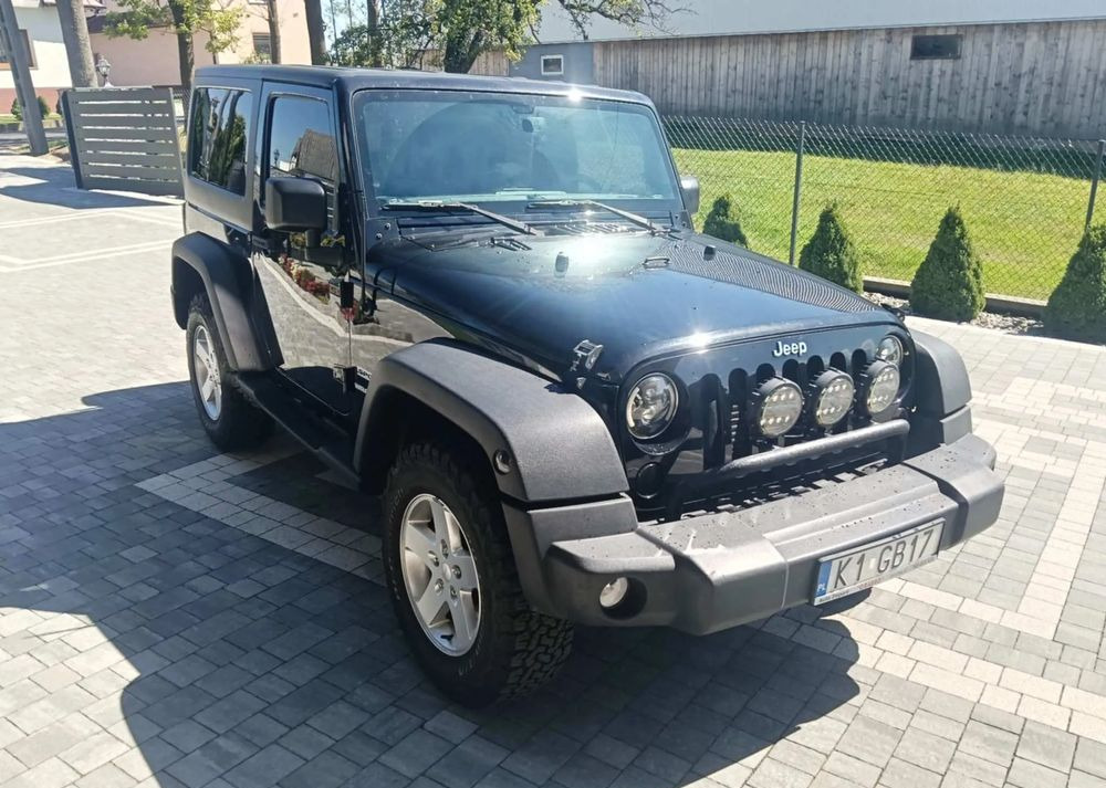 Jeep Wrangler 2.8 CRD Sport - كابريوليه: صور 1 Jeep Wrangler 2.8 CRD Sport - كابريوليه: صور 1