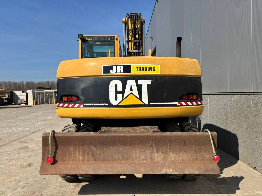 CAT M 313 C (Low verified hours) - حفارة على عجلات: صور 4 CAT M 313 C (Low verified hours) - حفارة على عجلات: صور 4