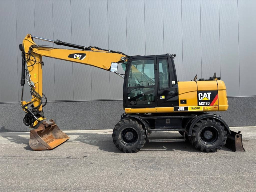 CAT M 313 D - حفارة على عجلات: صور 1 CAT M 313 D - حفارة على عجلات: صور 1