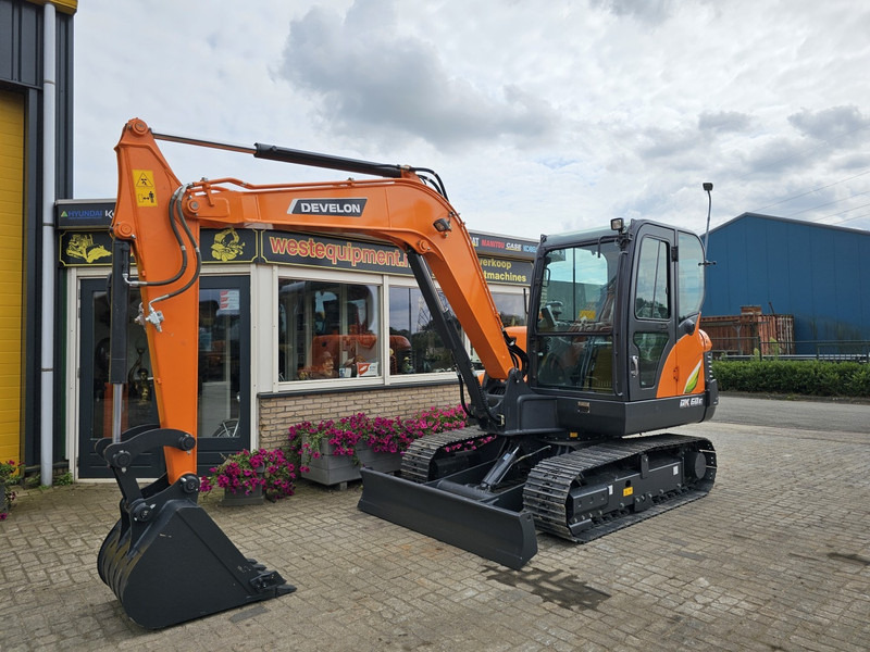 Develon DX60E-10N - حفارة مصغرة: صور 2 Develon DX60E-10N - حفارة مصغرة: صور 2