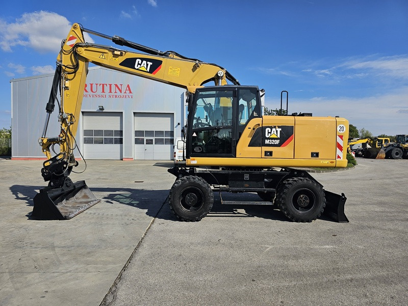 CATERPILLAR M320F - حفارة على عجلات: صور 1 CATERPILLAR M320F - حفارة على عجلات: صور 1