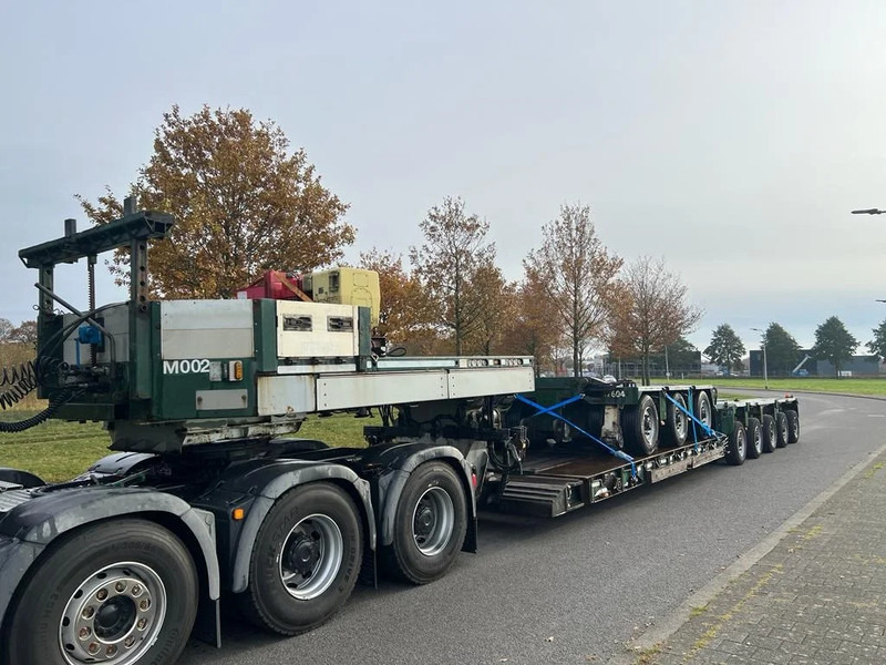 Goldhofer THP XLE 8 (3+5 low loader) - عربة مسطحة منخفضة نصف مقطورة: صور 1 Goldhofer THP XLE 8 (3+5 low loader) - عربة مسطحة منخفضة نصف مقطورة: صور 1